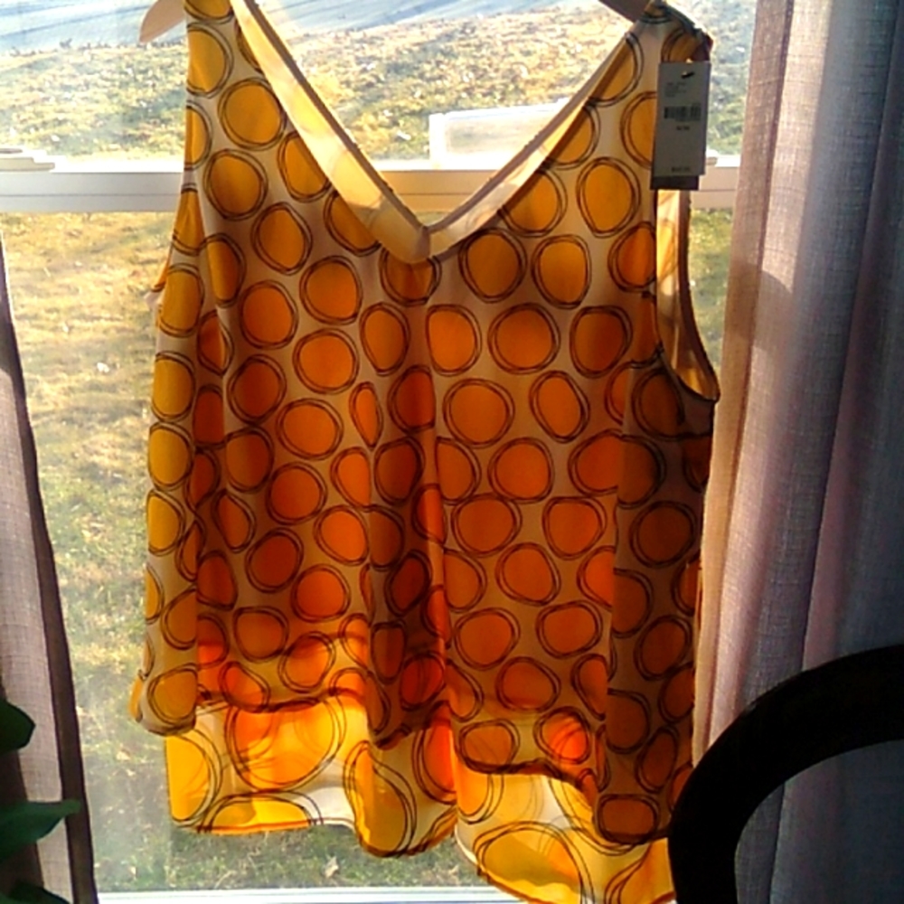 Womans yellow pockadot sleeveless blouse delicate